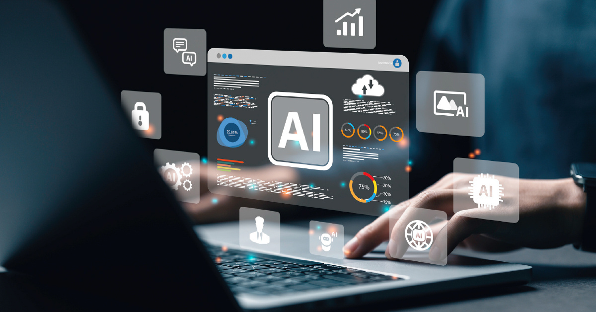 A worker at a laptop explores current data automation trends.