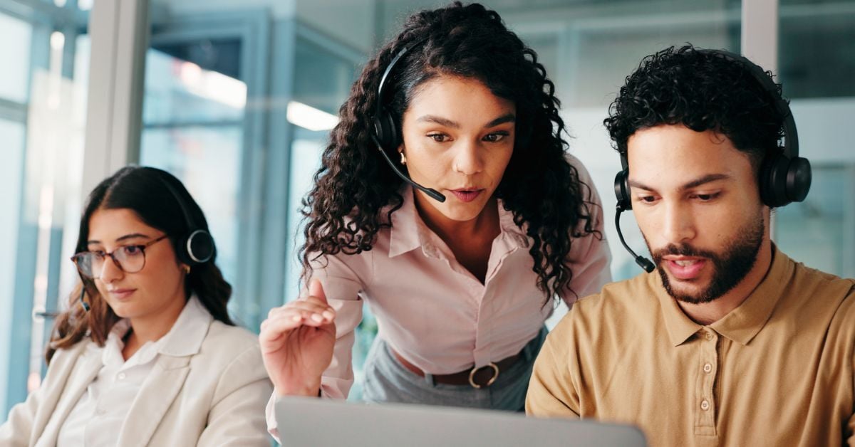 A call center team solving a business phone system issue. 