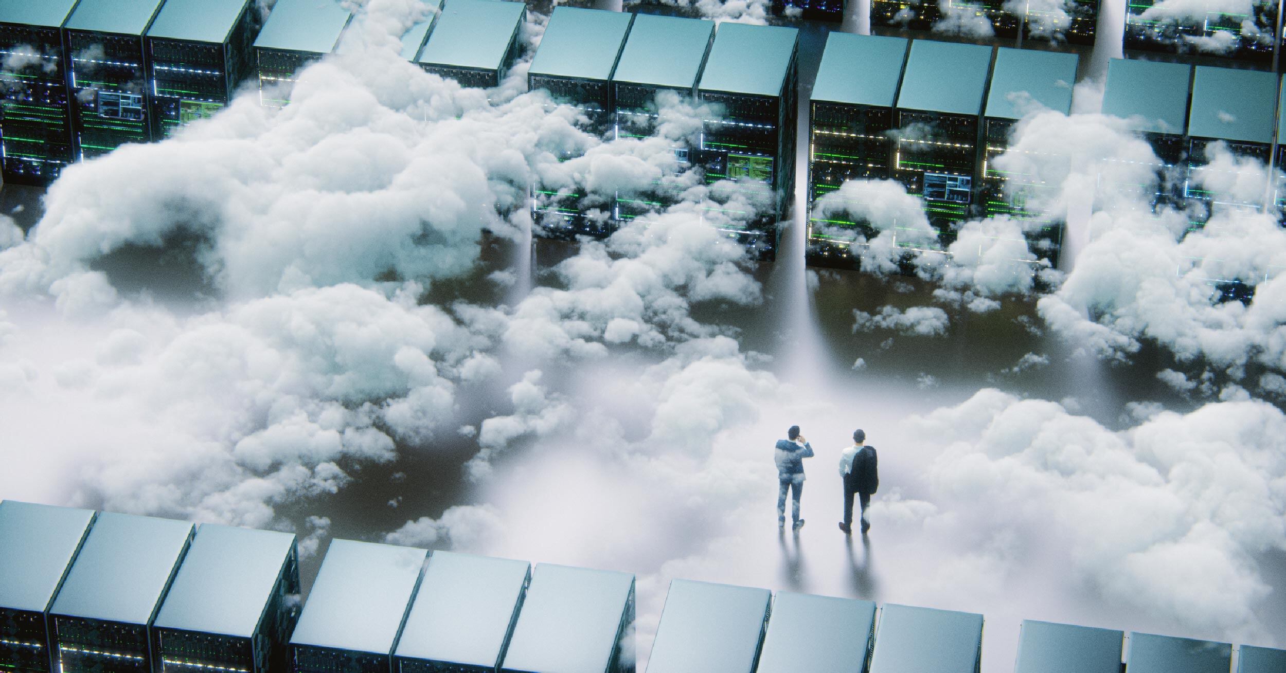Two IT workers survey their cloud computing environment and the servers powering it.