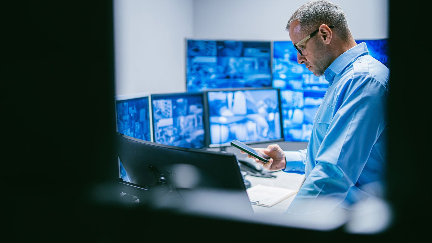 cyber-expert-reviewing-network-in-control-room