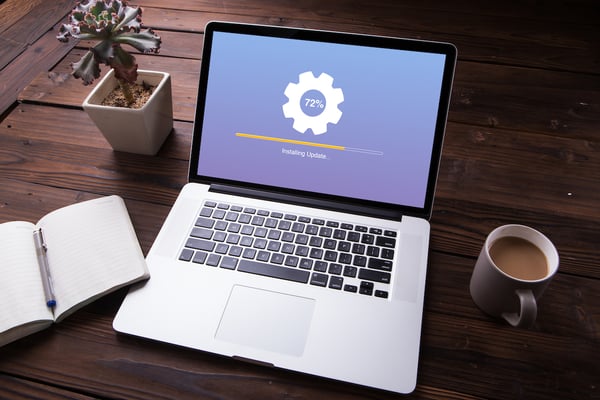 image of a laptop that's installing updates