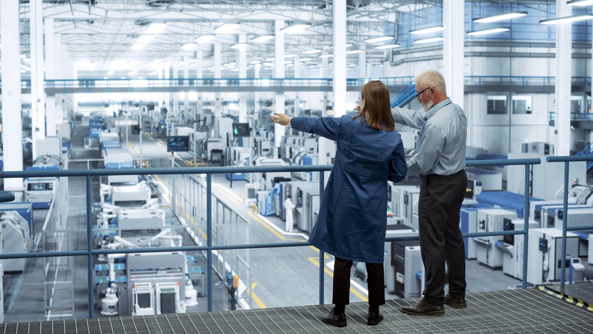 industrial-leaders-inspecting-production-facility.