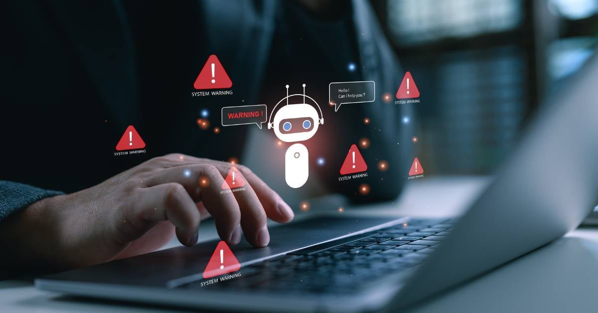 Person on computer targeted by cybersecurity attack. 