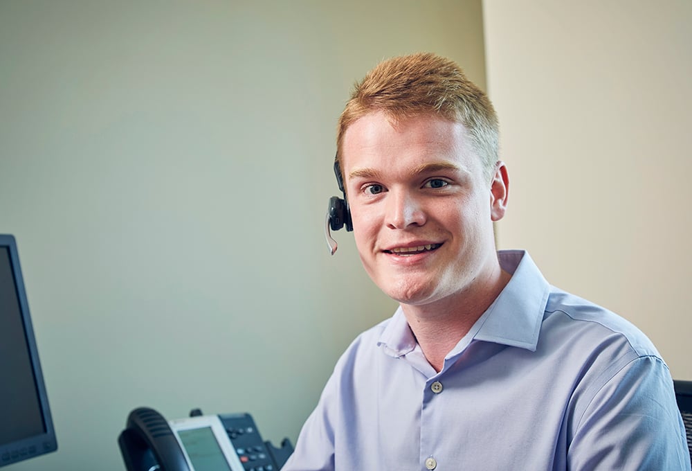 Smiling call worker