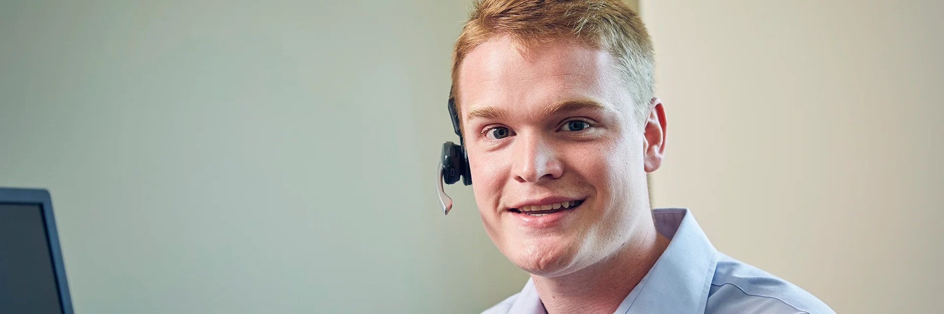 Smiling call worker