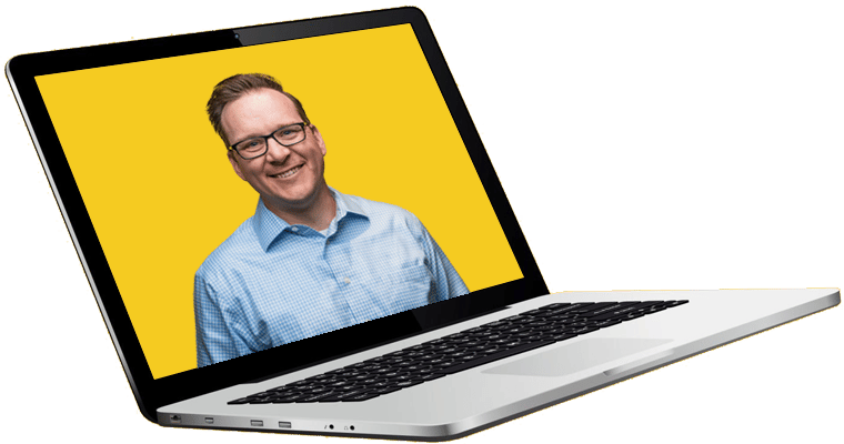 smiling individual on laptop screen